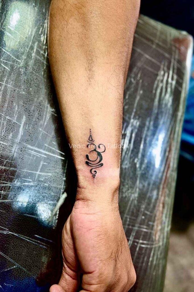 Om unalome tattoo for male hand- Best tattoo studio in bangalore