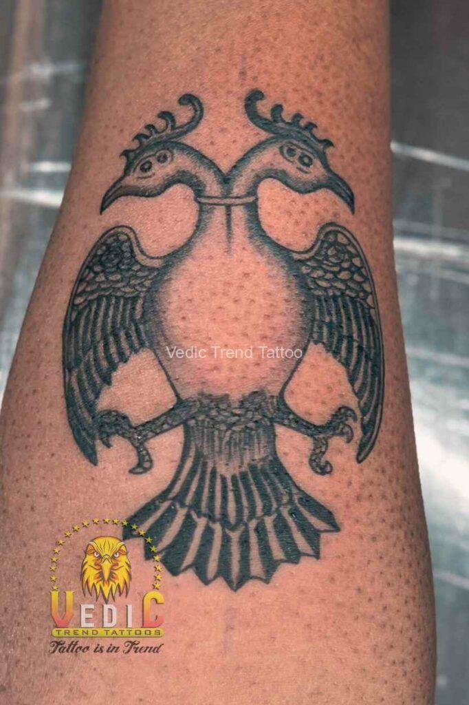 gandaberunda symbol government  of karnataka logo tattoo on girl hand- vedic Trend Tattoo-BLR