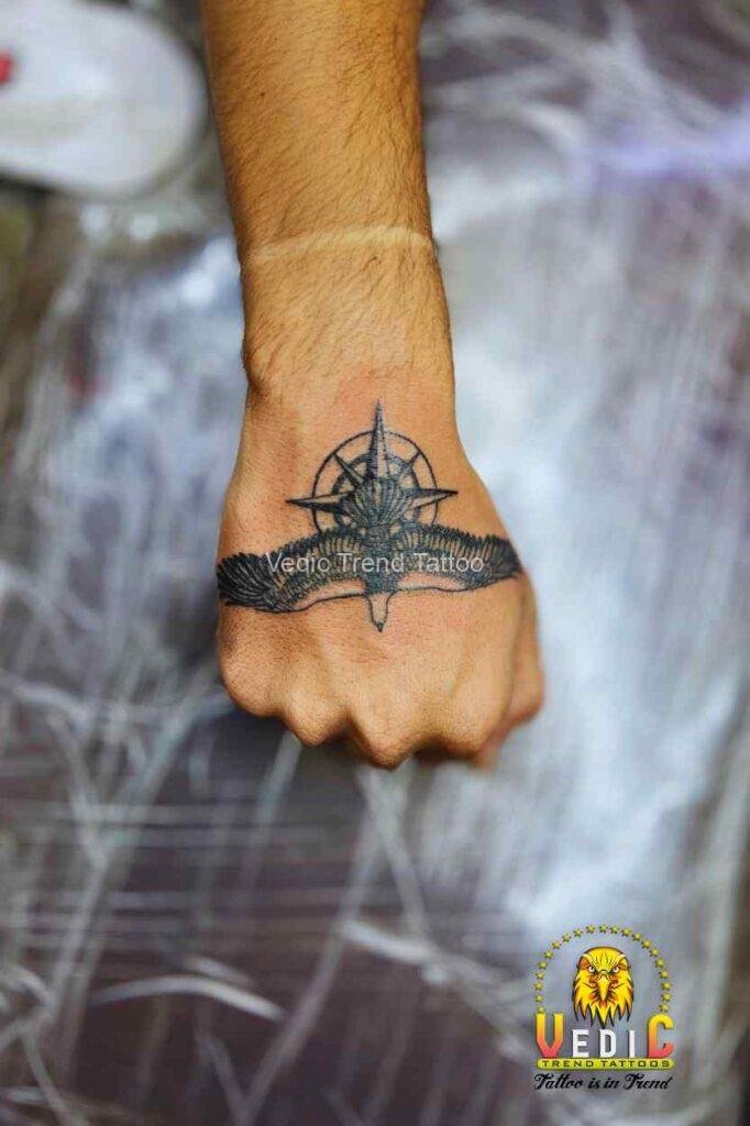 navigation-eagle-flying-tattoo-on-boy-wrist-vedic trend tattoo-bangalorea