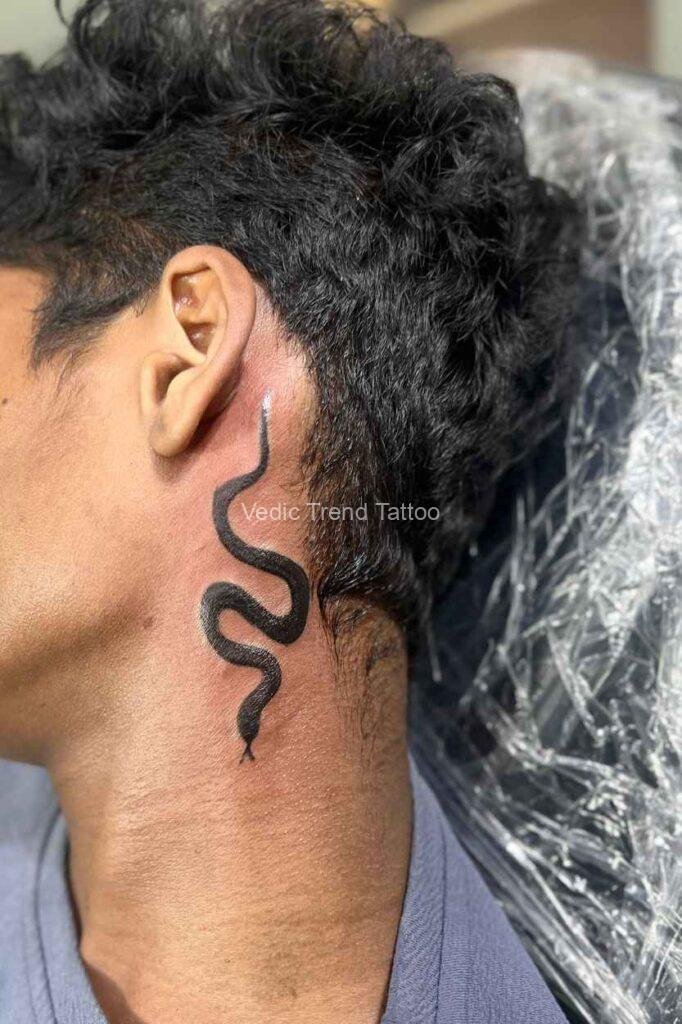 Tattoo ink - snake-black-solid-color-tattoo-on-neck-tattoo-for-male-left-side.