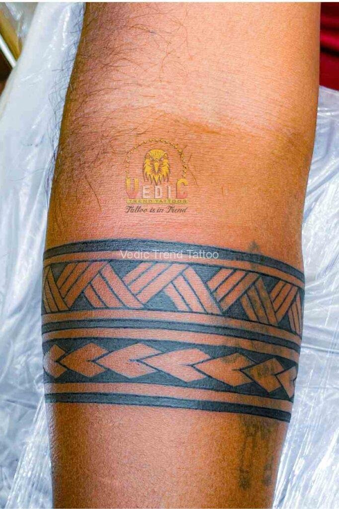 tribal forarm band tattoo