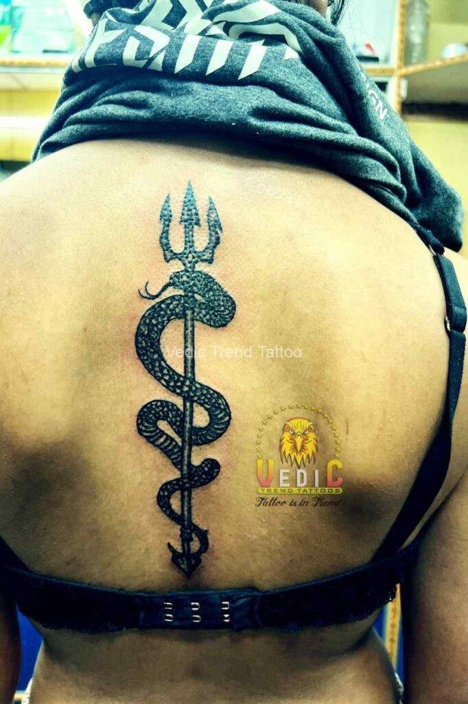 Snake-curling-Aquaman Trident-tattoo-studio-bangalore