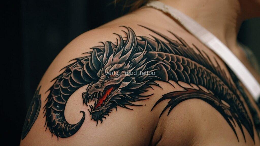 Dragon tattoo design on a girl's shoulder by Vedic Trend Tattoo.